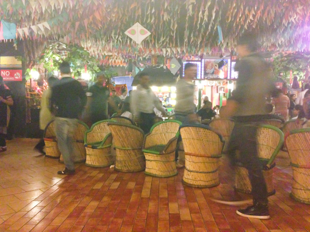 Musical chairs in a village-themed resturant